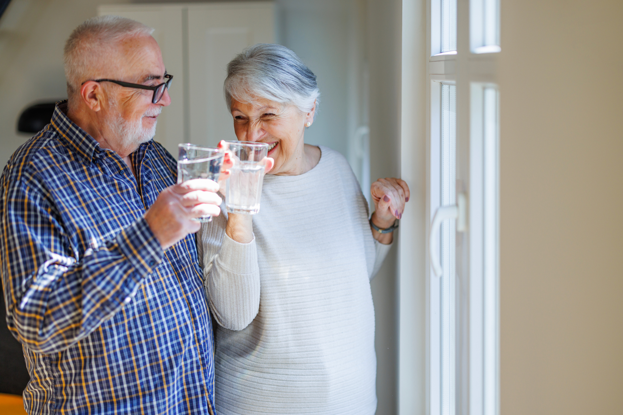 Senior couple drinking water